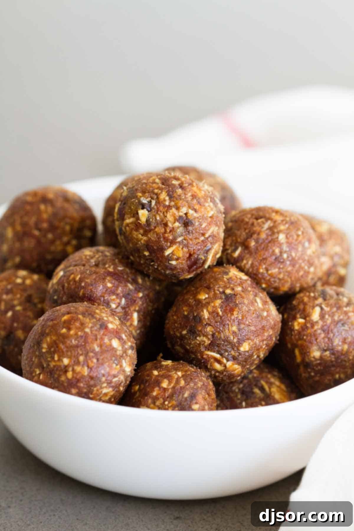 A bowl filled with delicious Peanut Butter Chocolate Energy Balls, perfect for a healthy snack.