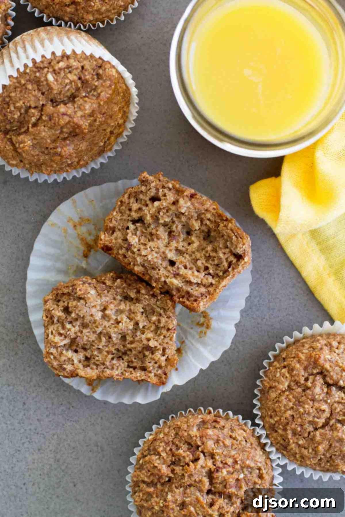 Overhead shot of freshly baked Whole Wheat Bran Muffins arranged beautifully, inviting a healthy and delicious breakfast.