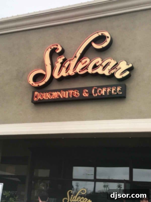 Sidecar Doughnuts and Coffee: A must-visit destination in Costa Mesa, California. The vibrant exterior of Sidecar Doughnuts and Coffee in Costa Mesa, California, bustling with customers.