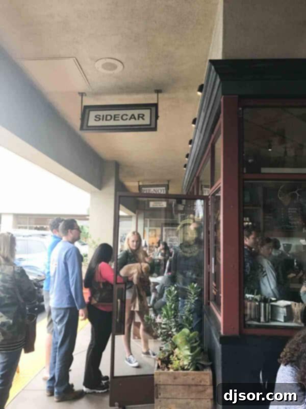 Sidecar Doughnuts: A delightful stop in Costa Mesa, California. The charming exterior of Sidecar Doughnuts in Costa Mesa, California, emphasizing its inviting local appeal.