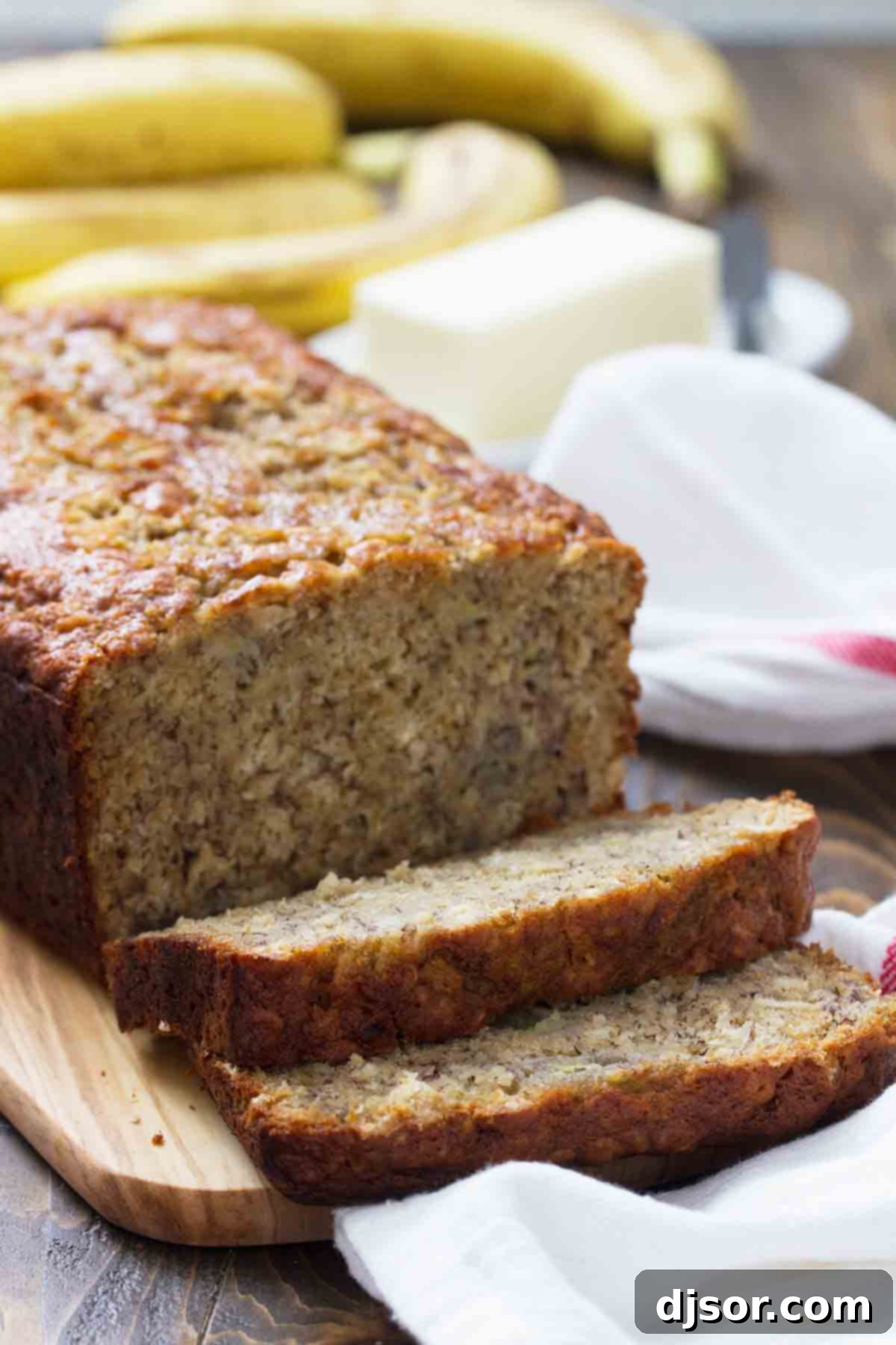 Sliced Banana Oat Bread on a cutting board.