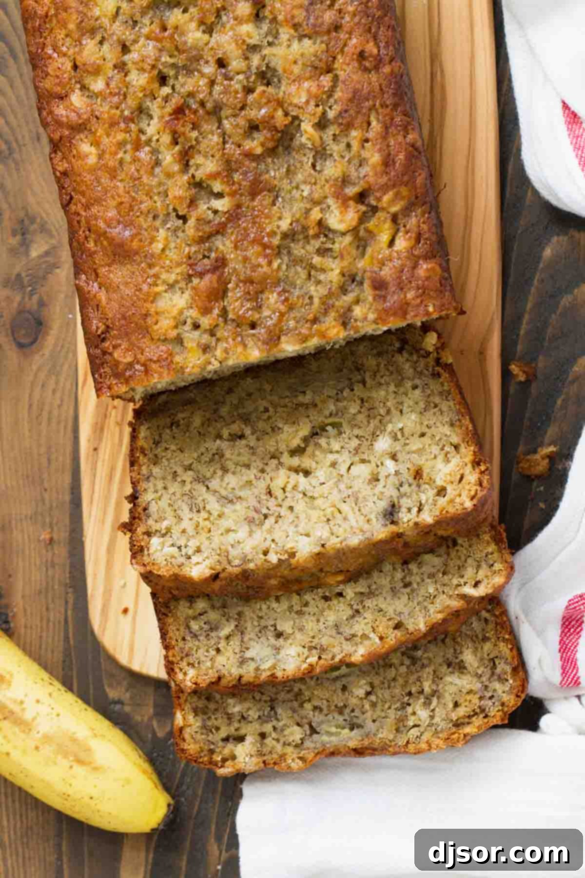 Banana Oat Bread from the top with a few pieces sliced.