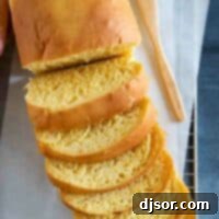 Overhead view of sliced loaf of butternut squash bread.