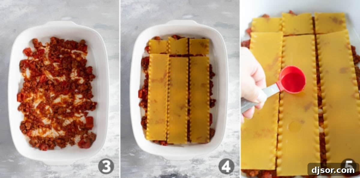 Layering sauce and noodles and adding broth to noodles for lasagna.