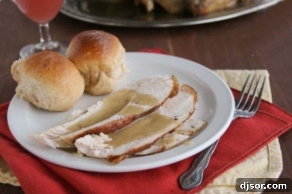 Crafting Your Perfect Thanksgiving 3 A beautifully golden-brown Honey Herb Glazed Turkey presented on a festive platter, glistening with its sweet and savory glaze.