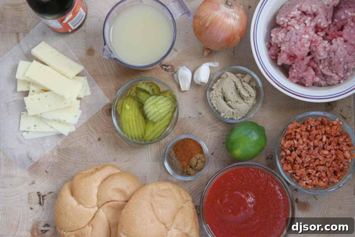 Mojo Sloppy Joes 3 A selection of fresh ingredients laid out on a wooden board, including ground pork, chorizo, onion, garlic, lime, spices, and a can of tomato sauce, ready to be prepared for Cuban Sloppy Joes.
