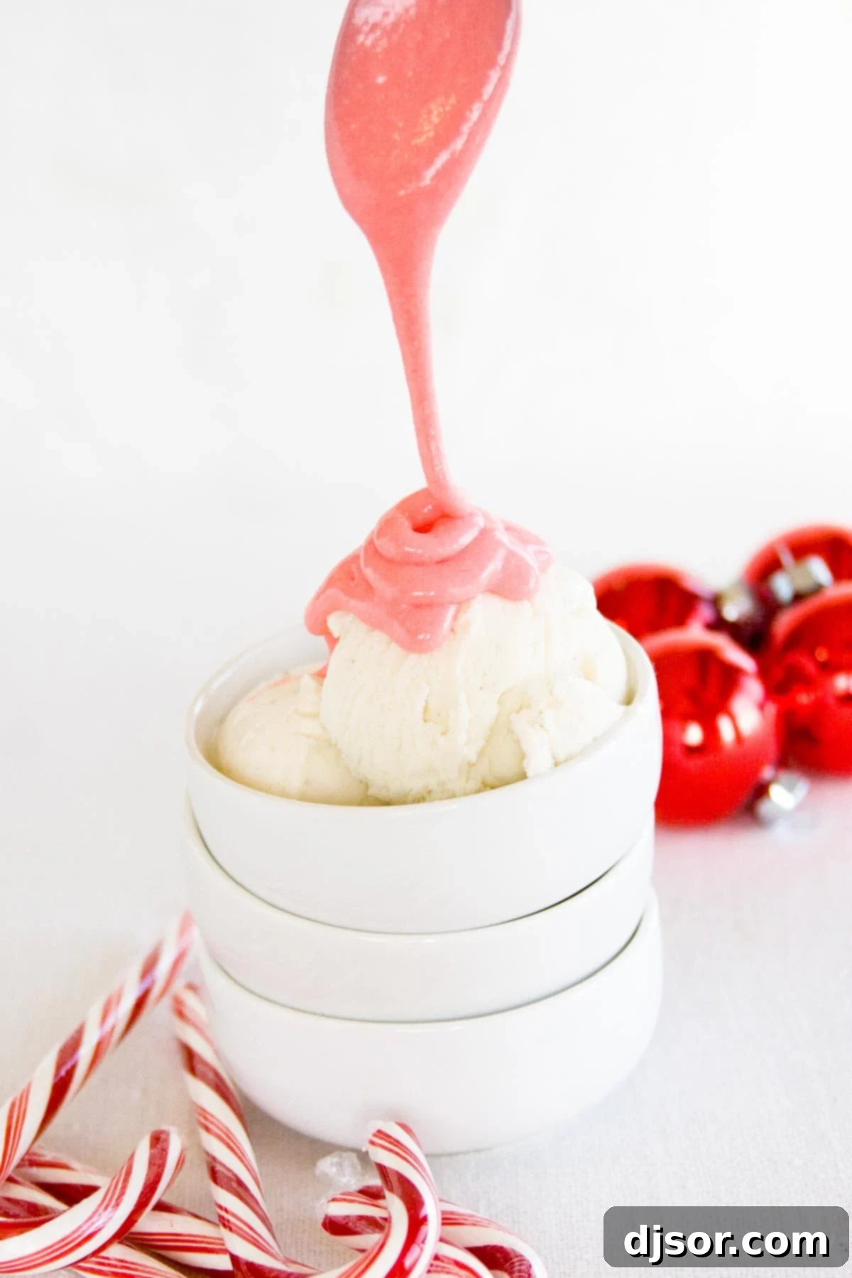 Velvety Peppermint Cloud Topping 2 Drizzling peppermint marshmallow sauce over a scoop of vanilla ice cream.