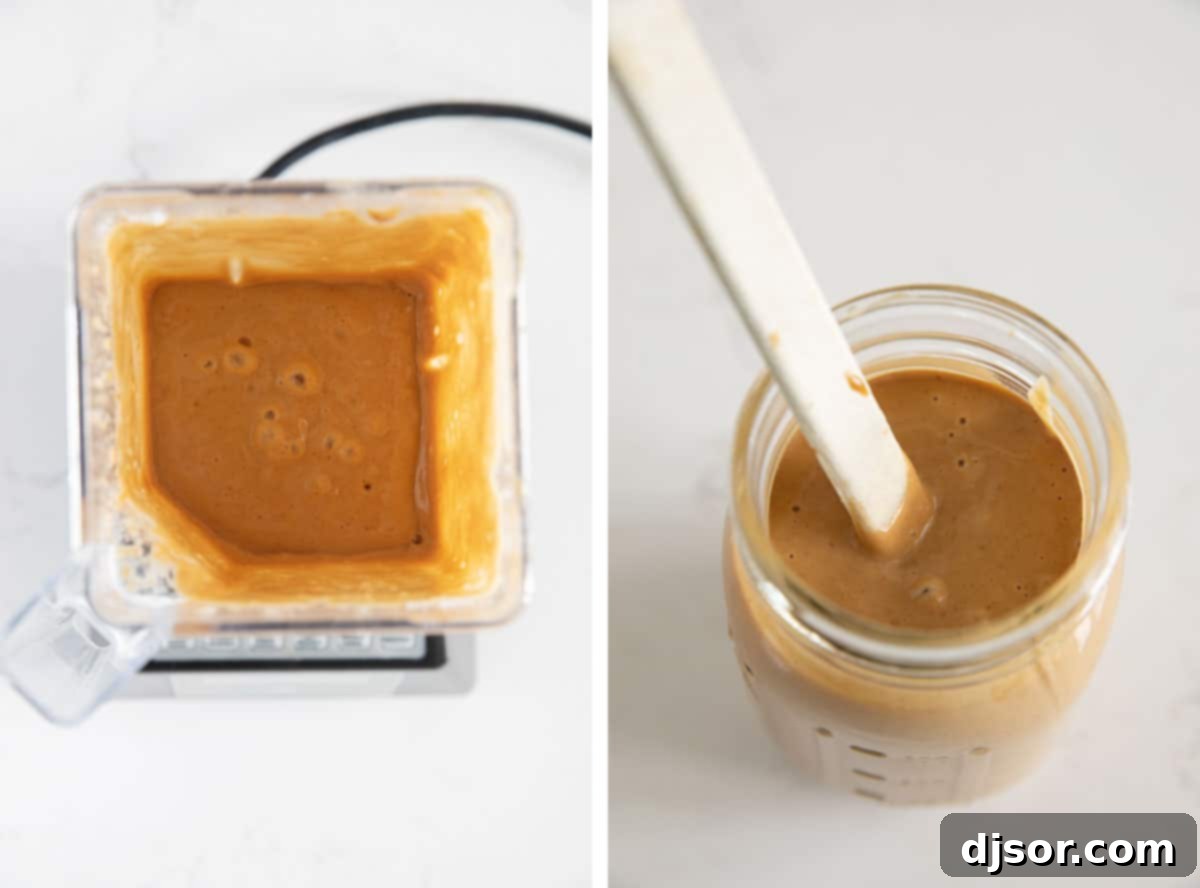 Close-up shot of peanut sauce being blended to a smooth consistency in a blender, highlighting the creamy texture.