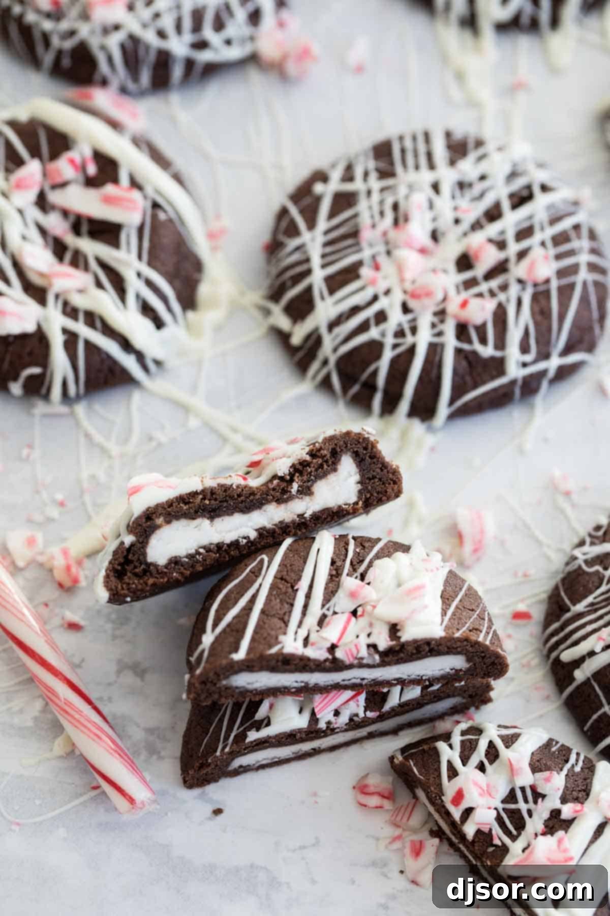 Chocolate Peppermint Cookies recipe with cookie sliced in half to show peppermint patty on the inside.