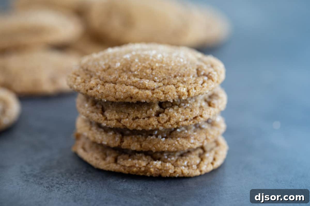 Stack of 4 ginger cookies on top of each other.