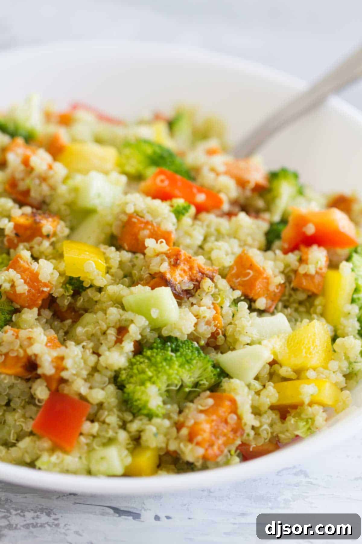 An overhead shot of a freshly prepared Quinoa and Roasted Sweet Potato Salad, ready to be served.