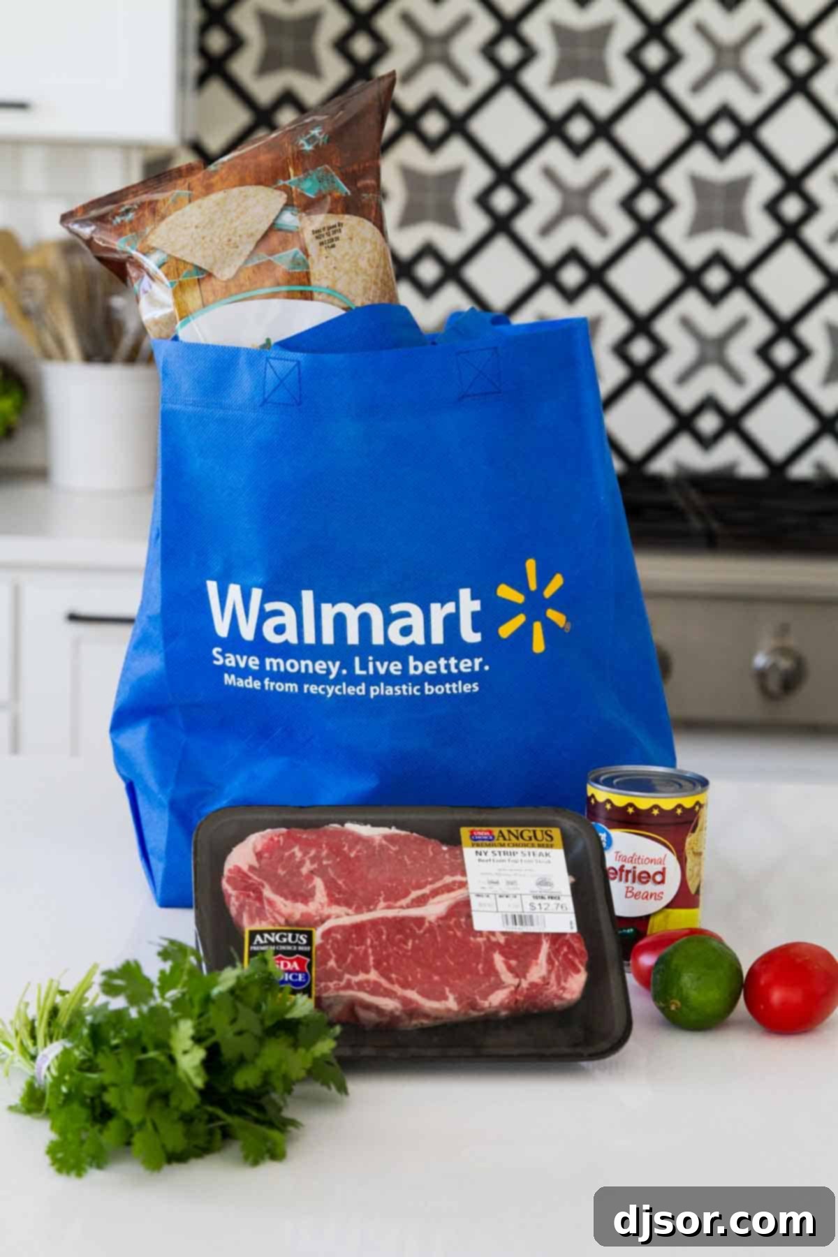 Array of fresh ingredients ready for Sheet Pan Steak Nachos Supreme, including steak, cheese, and vegetables.