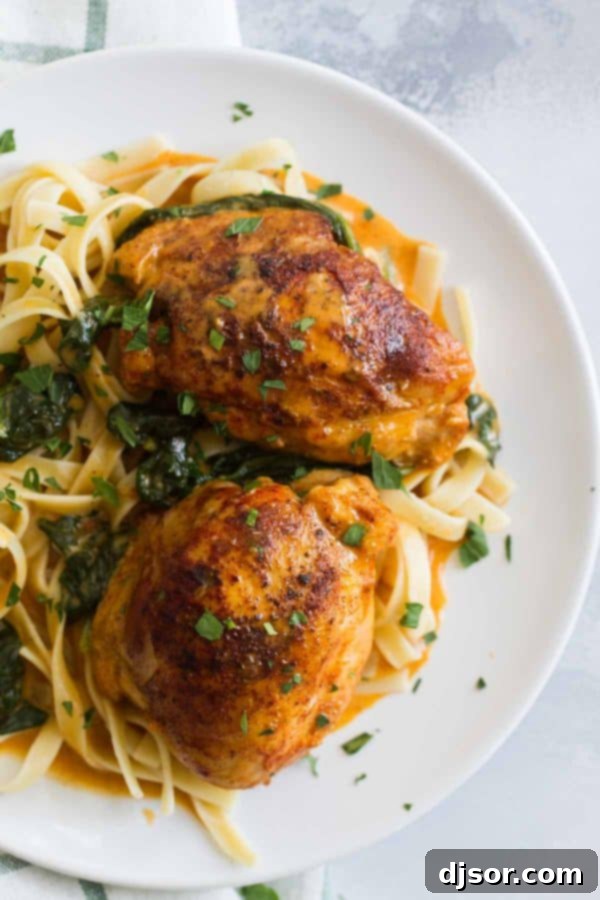 Restaurant quality at home - these Garlic Paprika Instant Pot Chicken Thighs make even a weeknight special! Seasoned boneless chicken thighs are served in a delicious cream sauce - perfect for a date night in! Two garlic paprika chicken thighs made in the instant pot.