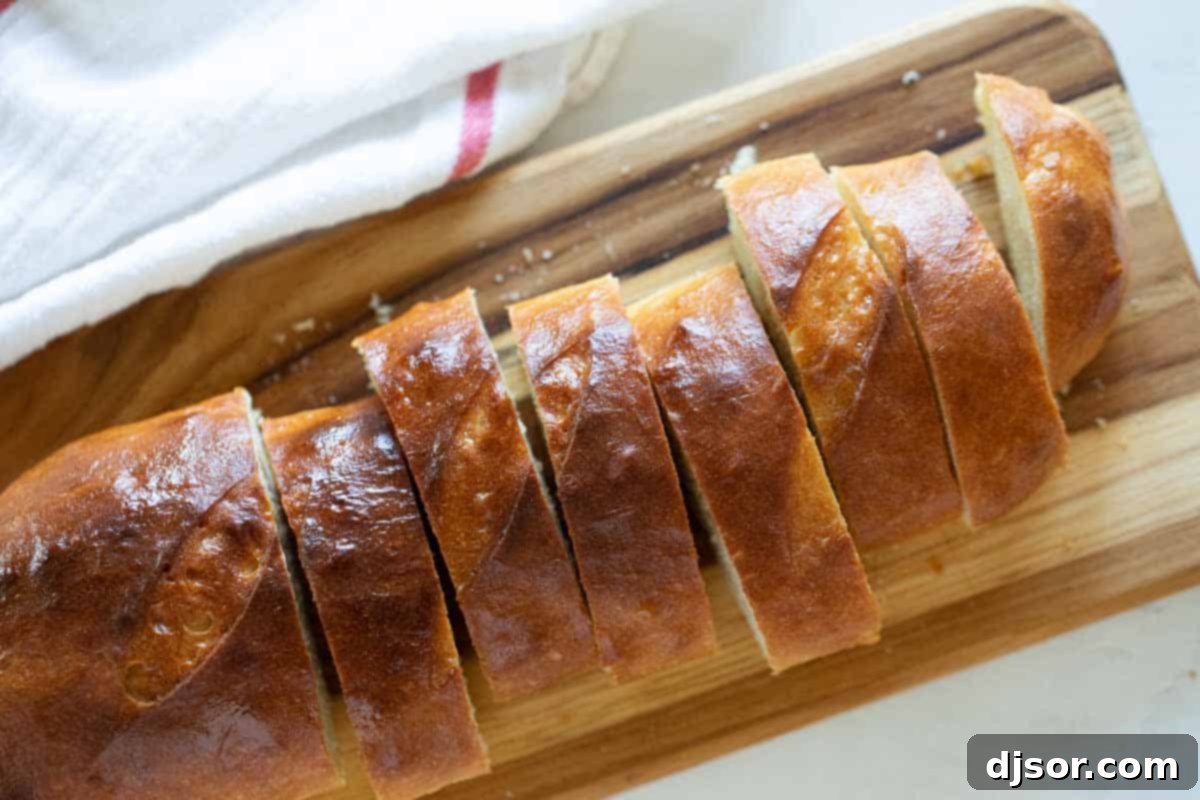 Interior View of Sliced French Bread Close-up of a perfectly sliced French bread loaf, showing its airy and tender interior