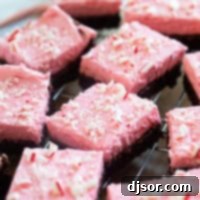 Chocolate Peppermint Dream 10 Peppermint Brownies cut into bars on a cooling rack.