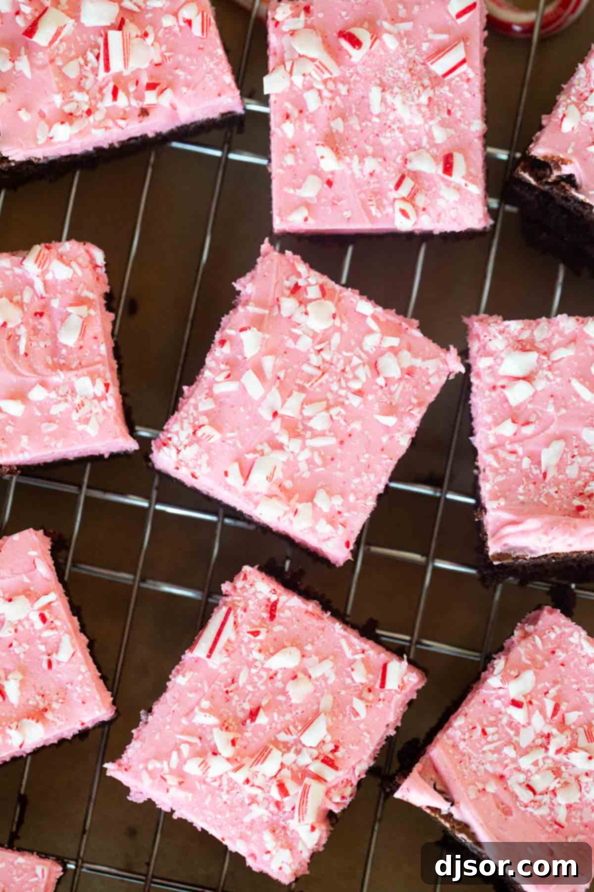 Chocolate Peppermint Dream 7 A freshly baked batch of dark chocolate peppermint brownies cooling on a wire rack, waiting for their sweet frosting.