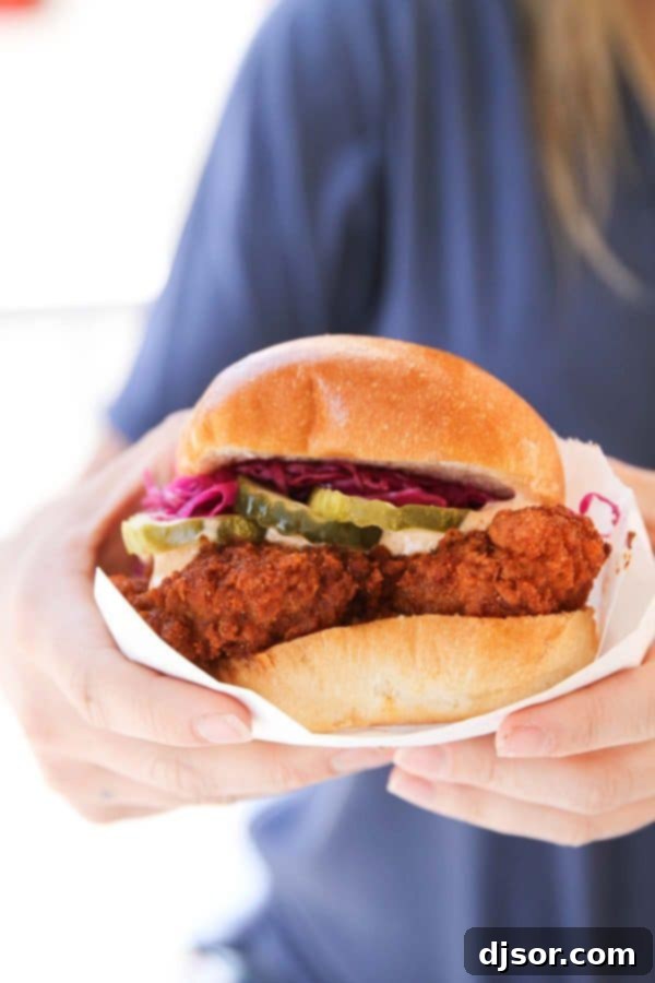 A perfectly fried hot chicken sandwich with pickles, from Pretty Bird in Salt Lake City, Utah.