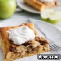 Slice of Apple Tart with Almond Tosca Topping