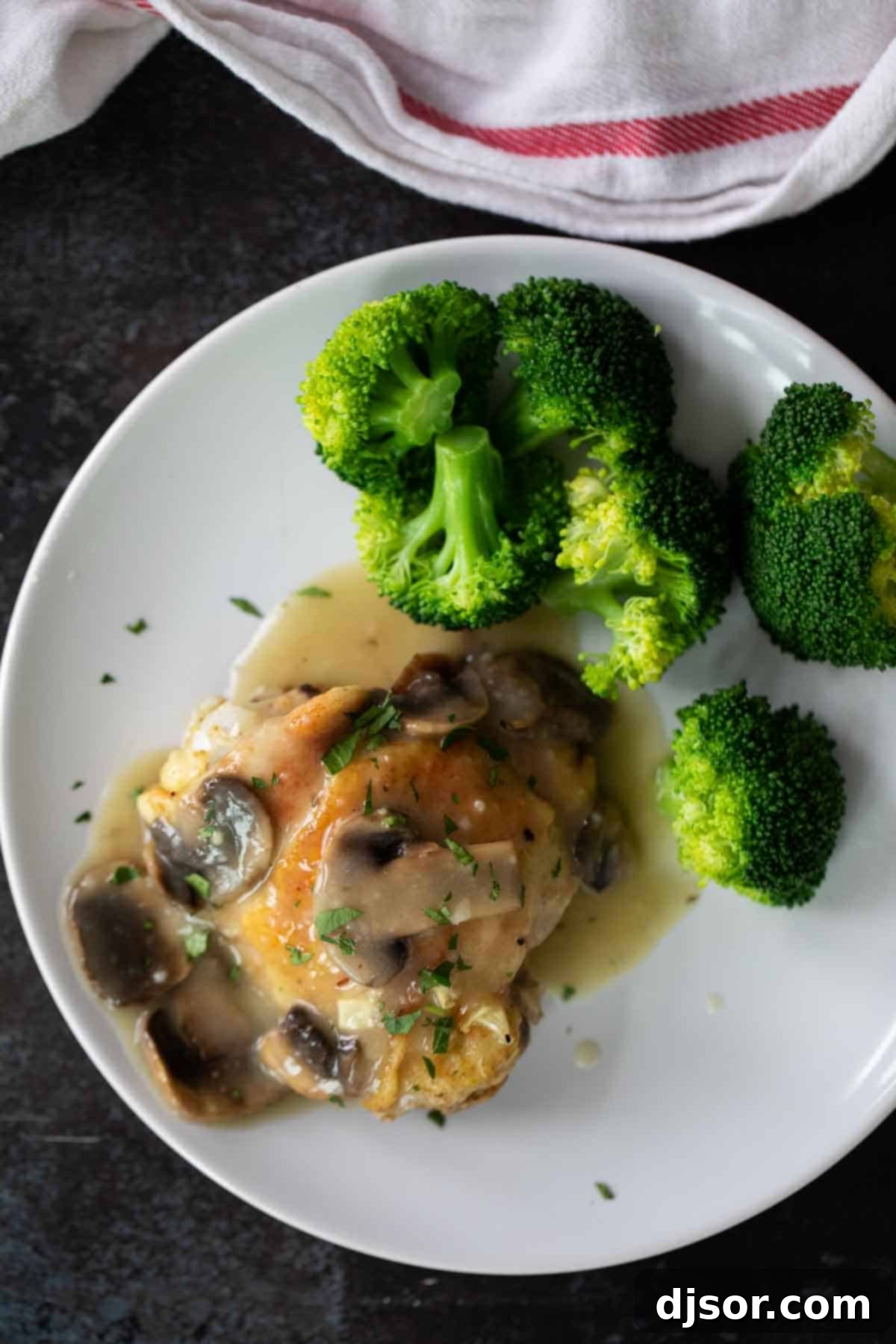Chicken Supreme served with a side of steamed broccoli for a complete meal.
