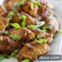 Imperial Wings 4 Empress Chicken Wings with soy sauce and ginger.