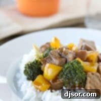 Sticky Hoisin Beef Stir-fry 2 Hoisin Beef with Vegetables over rice on a plate