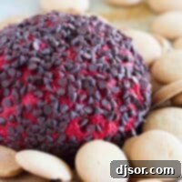 Velvet Red Cheese Truffles 5 Red Velvet Cheese Ball on a plate with cookies