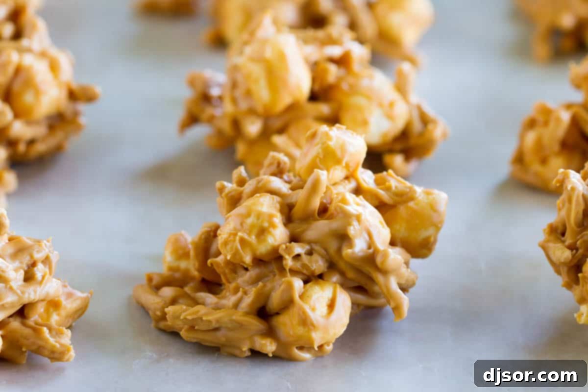 Haystack cookies cooling on wax paper.