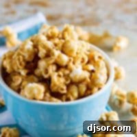 Golden Caramel Crunch Popcorn 5 Baked Caramel Popcorn in a blue bowl