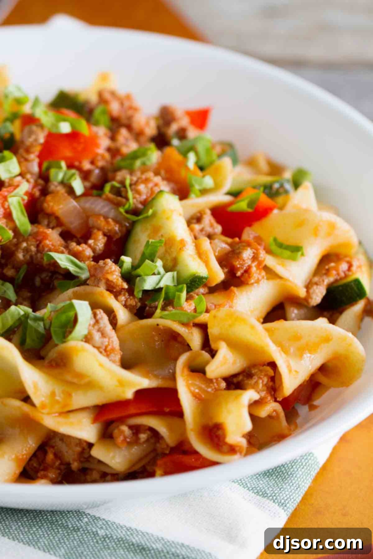 Close-up of a vibrant bowl of homemade Turkey Goulash, rich with vegetables and noodles, ready to be enjoyed.