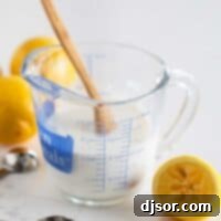 Buttermilk substitute in a glass, ready for baking