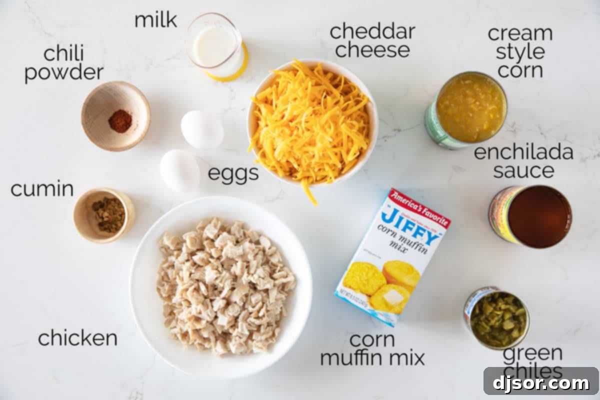 Fresh and delicious ingredients laid out for preparing Chicken Tamale Casserole, including cheese, corn, muffin mix, green chiles, milk, eggs, and spices.