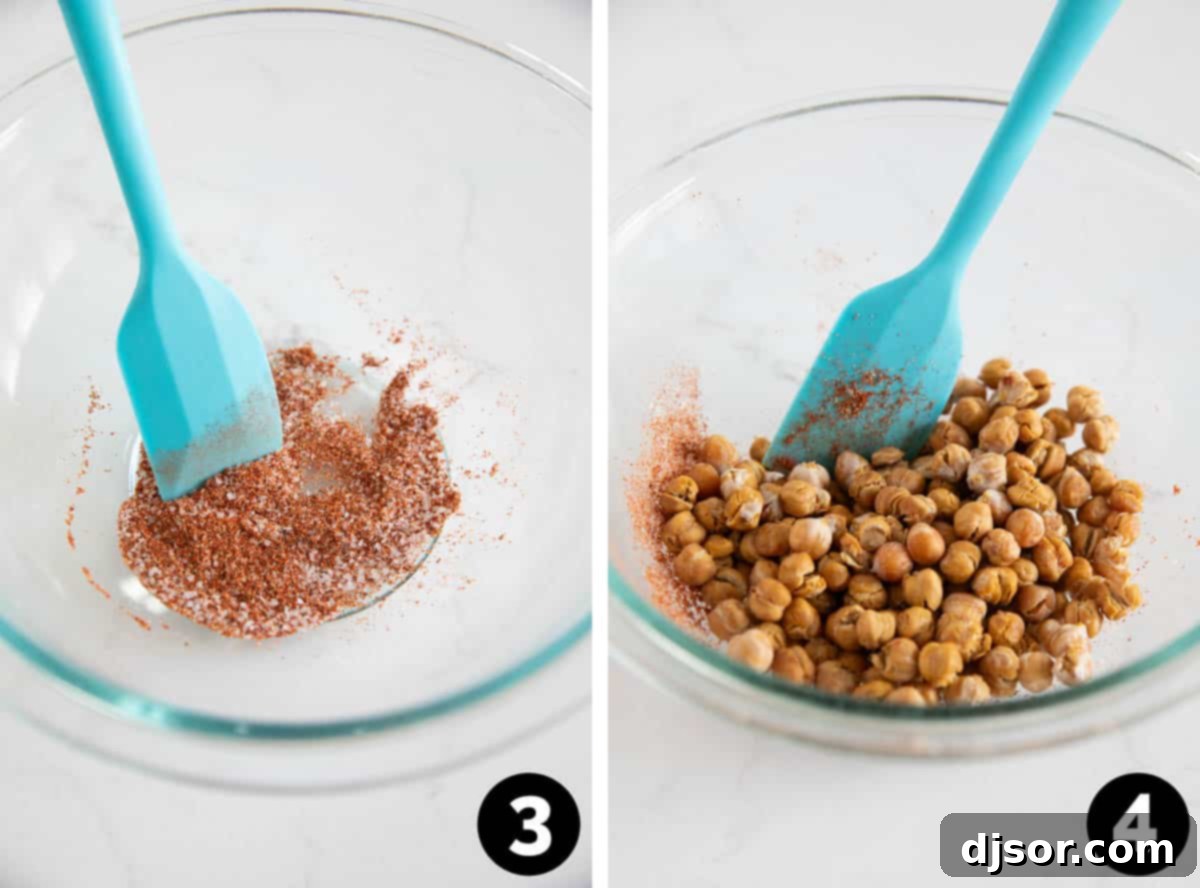 A small white bowl filled with a vibrant blend of ground spices: smoked paprika, chili powder, salt, and garlic powder.