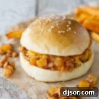 Hawaiian sloppy joes with filling falling out.
