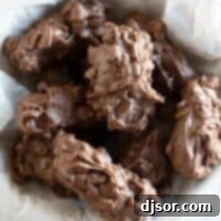 DIY Million Dollar Caramel Crisp Bars 2 A bowl filled with homemade 100 Grand candy bars, a delightful homemade treat.