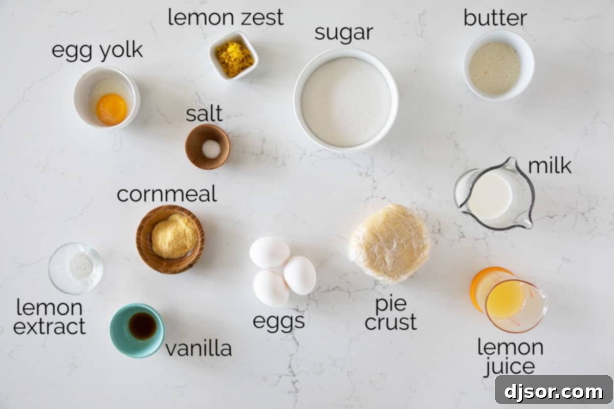 All the fresh ingredients laid out for baking Lemon Chess Pie, including lemons, eggs, and butter.