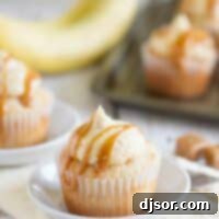 Caramel Banana Cupcakes drizzled with caramel on a plate, showcasing a delightful dessert.