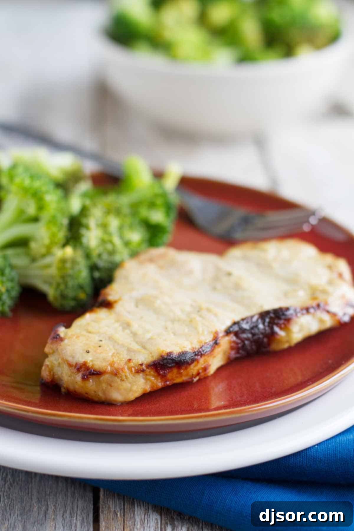 Sweet and Tangy Glazed Pork Chops 2 grilled honey mustard pork chops - a delicious and healthy meal option