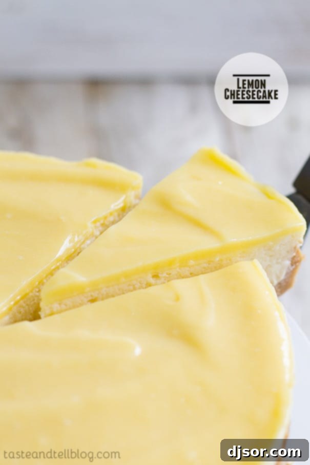 Creamy and rich Lemon Cheesecake with a cookie crust and tart lemon curd topping