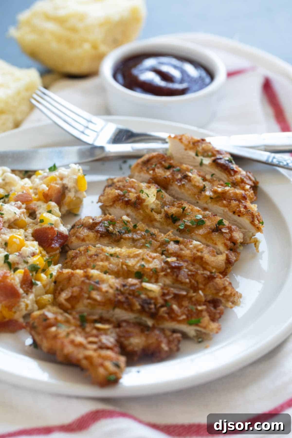 Piece of Potato Chip Chicken cut into slices on a plate, ready to be enjoyed.