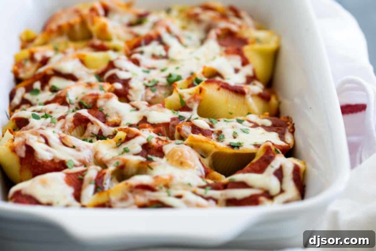 Baking Dish of Golden Brown Chicken Stuffed Shells Fresh Out of the Oven