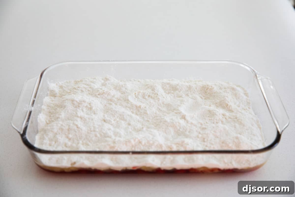 yellow cake mix on top of cherries and pineapple for dump cake