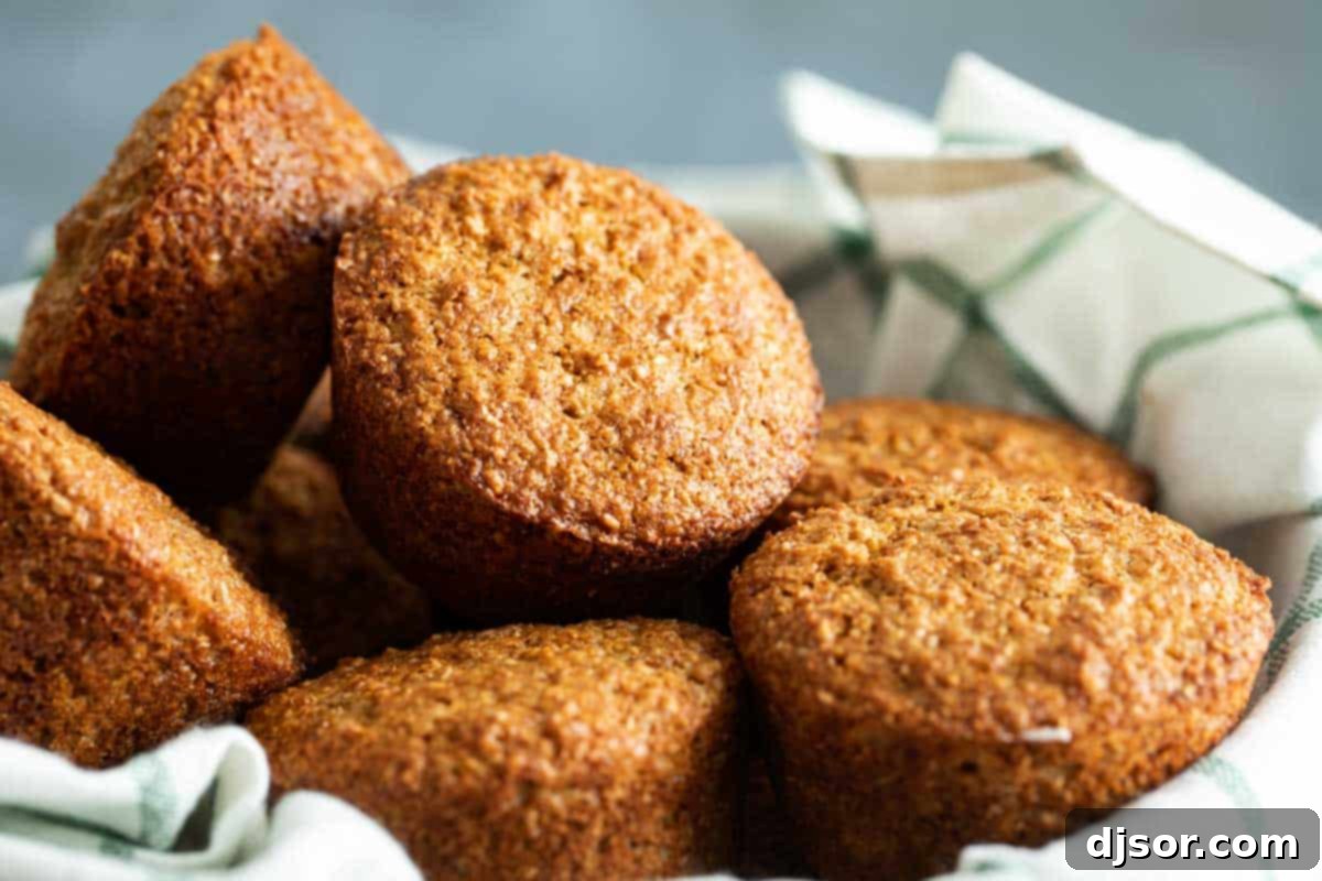 A healthy breakfast or snack to keep on hand, these Classic Bran Muffins are easy to make and filled with fiber. They make the perfect grab and go breakfast! Freshly baked Classic Bran Muffins with a golden brown top, perfect for breakfast or snack.