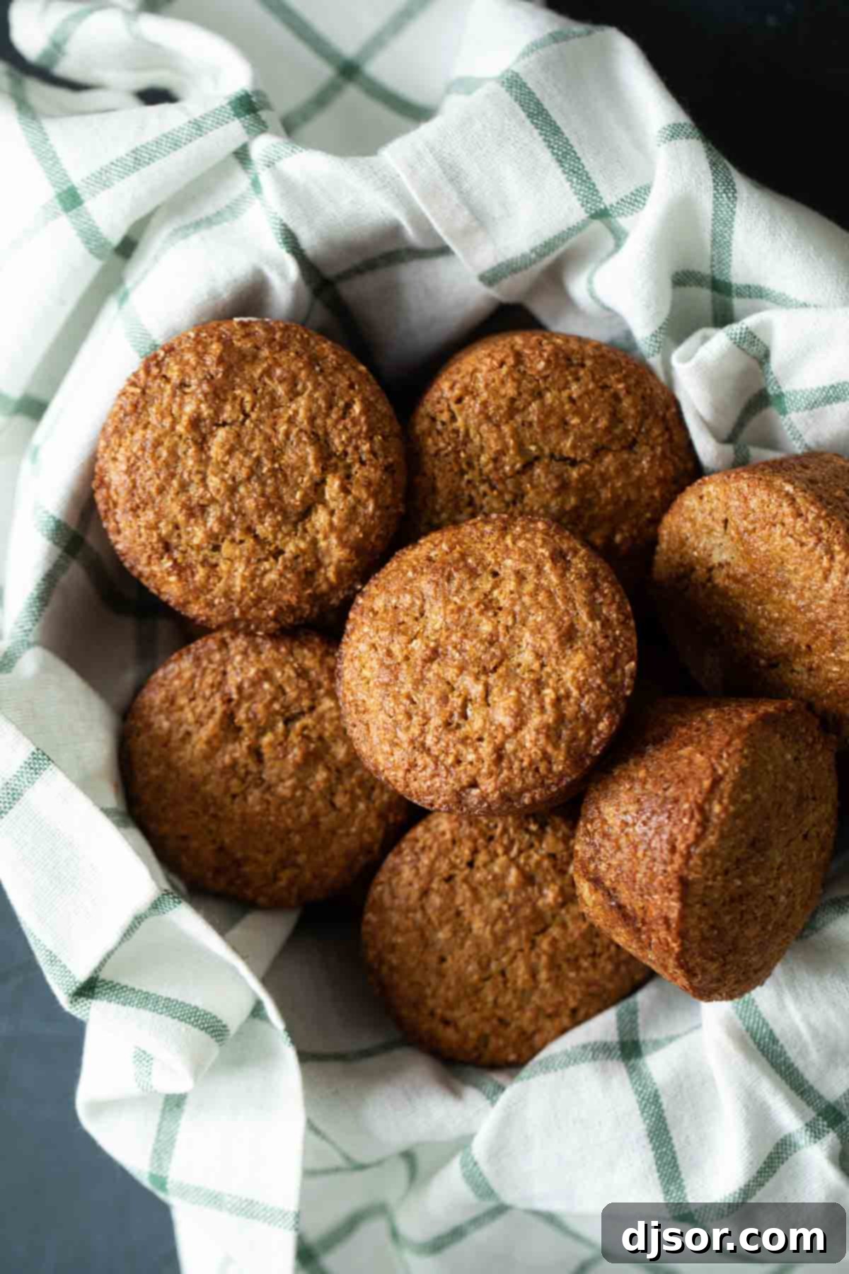 A healthy breakfast or snack to keep on hand, these Classic Bran Muffins are easy to make and filled with fiber. They make the perfect grab and go breakfast! A basket full of warm, golden brown classic bran muffins, ready to be enjoyed.