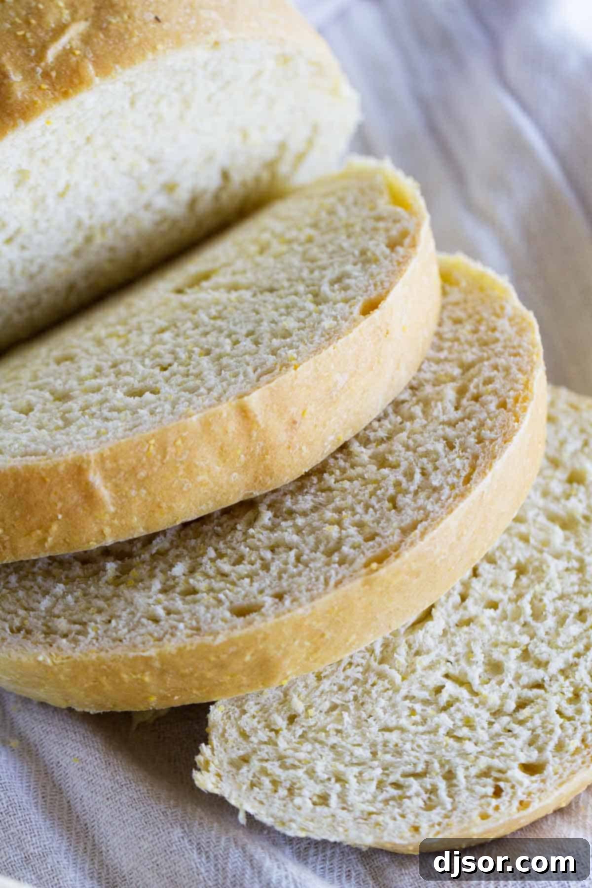 Golden Polenta Bread 3 Close-up view of the rustic texture of a freshly baked Polenta Bread loaf.