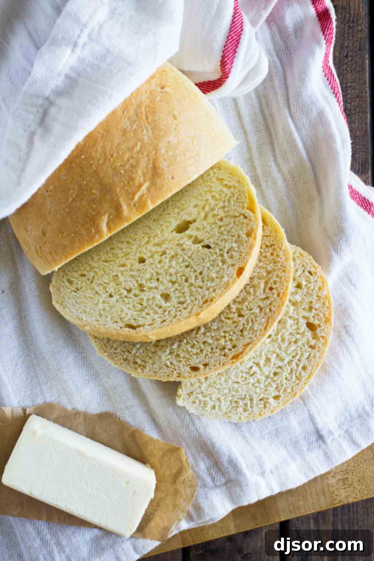 Golden Polenta Bread 4 Freshly baked Polenta Bread, sliced and ready to be served, showing its golden interior.