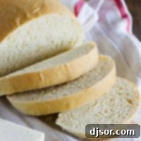 Golden Polenta Bread 6 Sliced polenta bread with butter next to it.