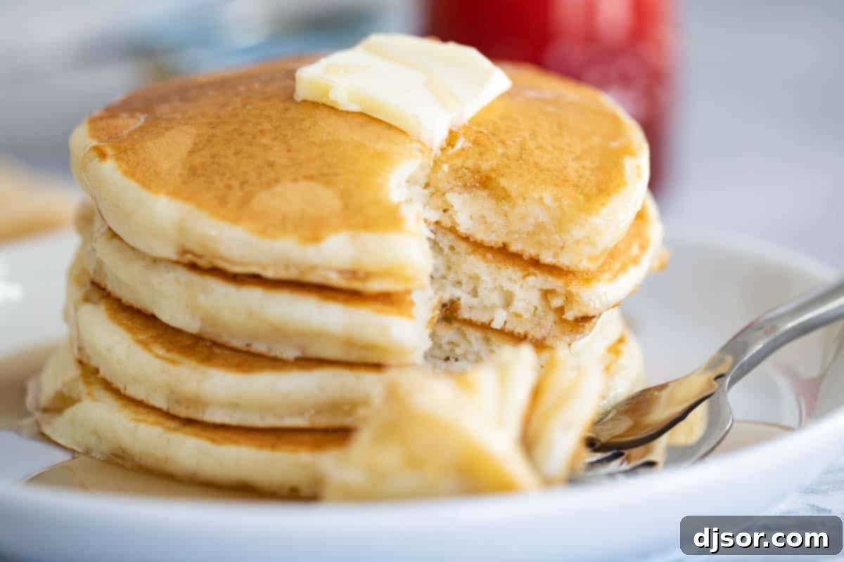 If you love fluffy and soft pancakes, this really is the Best Pancake Recipe! Made from pantry staples, these pancakes are the perfect breakfast recipe. texture of fluffy pancakes