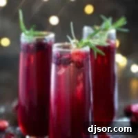 Crimson Pomegranate Cranberry Fizz 7 Three glasses of Virgin Pomegranate and Cranberry Bellini.