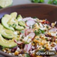 salad with grilled corn, black beans, avocado, and radishes