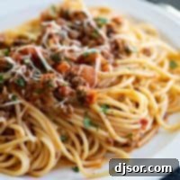 plate of Instant Pot Bolognese with spaghetti noodles
